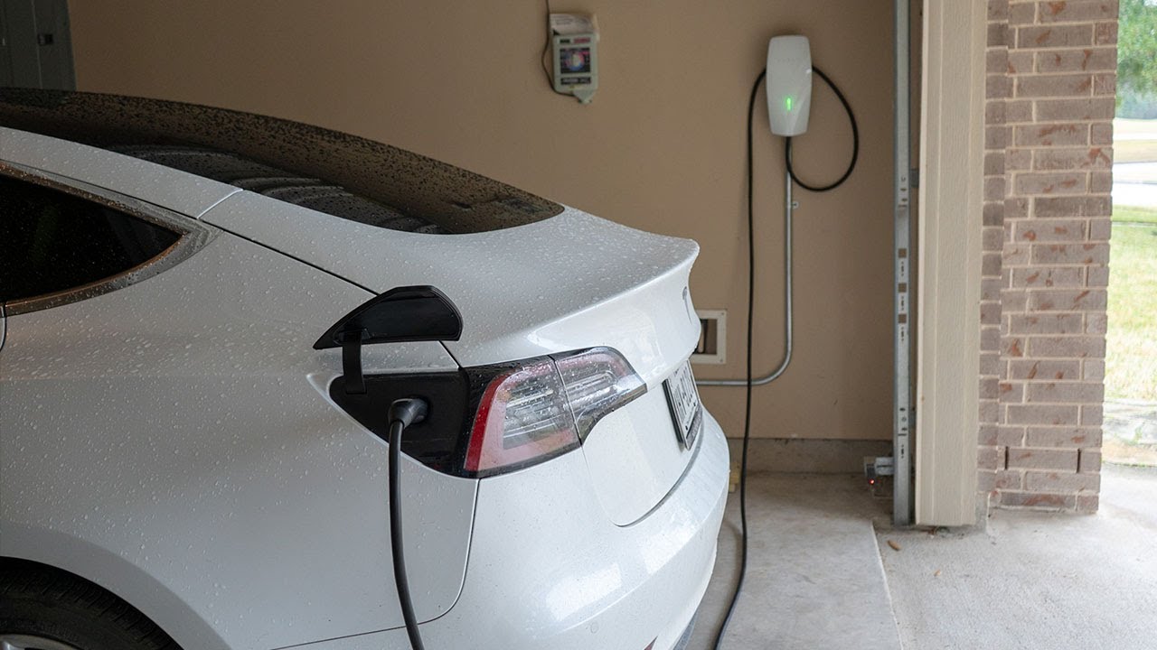 Electric vehicle charging station installation in garage